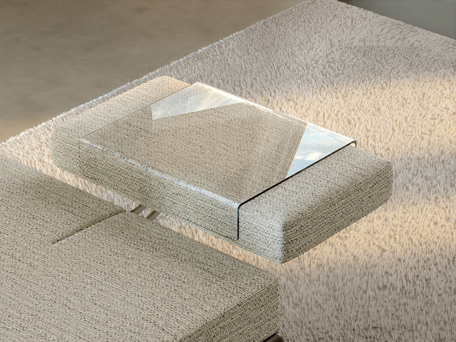 Modern glass coffee table on a textured surface