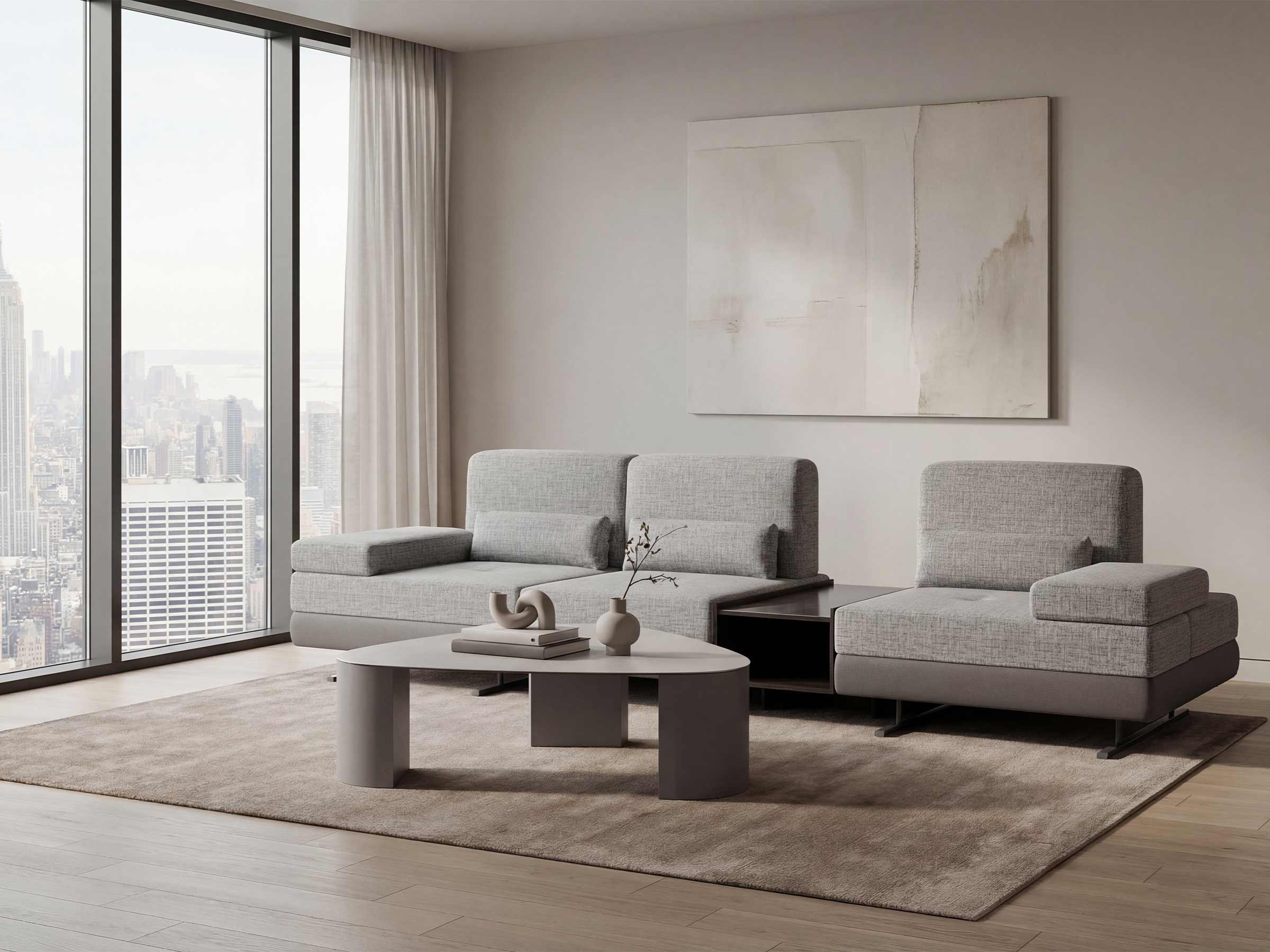 Modern living room with gray sofa, coffee table, and abstract painting.