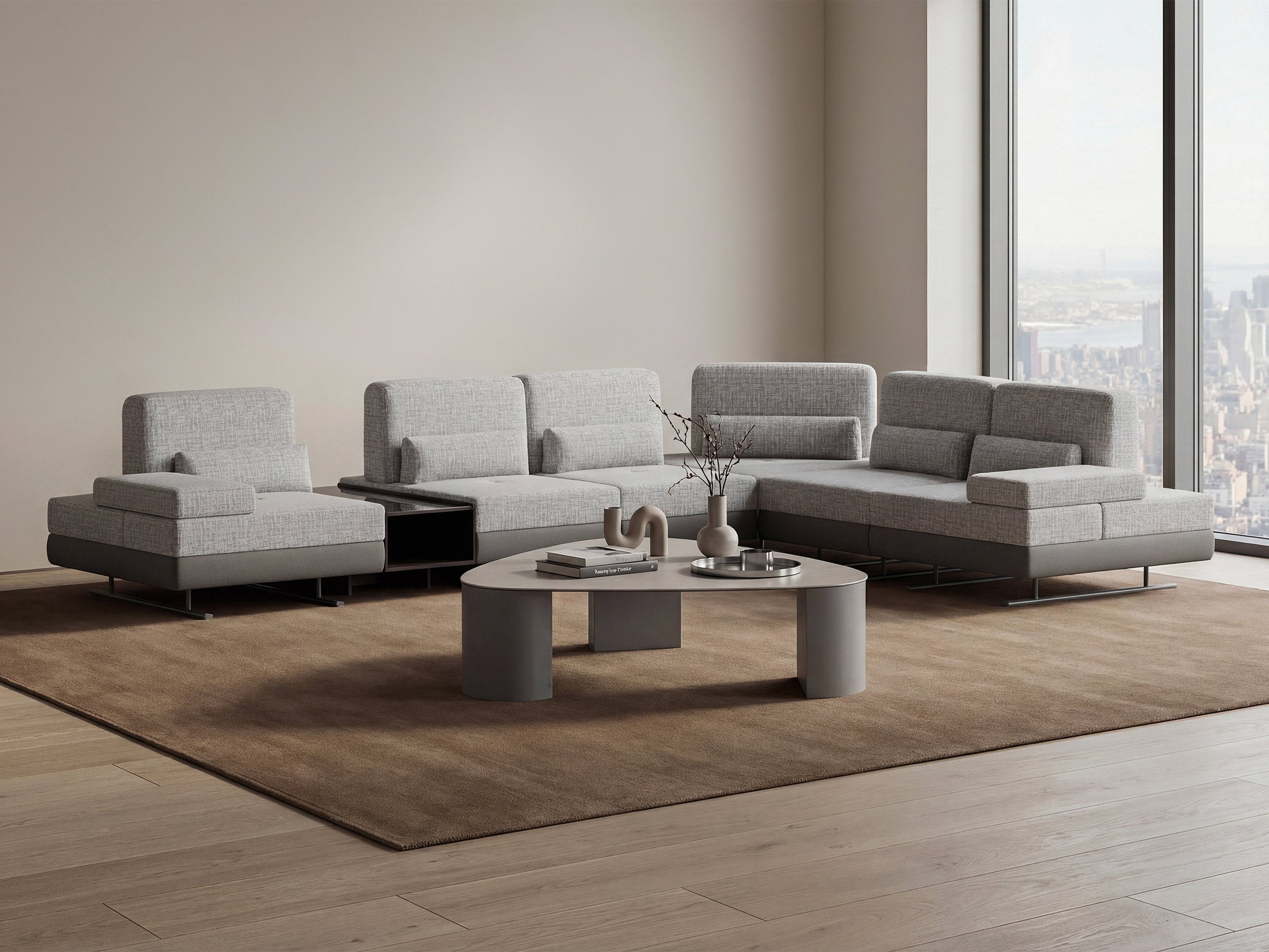 Gray sectional sofa with a coffee table in a modern living room.
