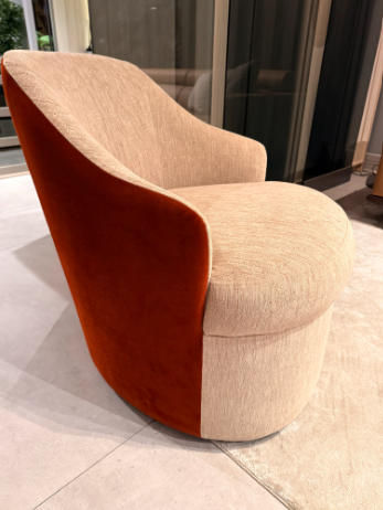 Modern chair with a two-tone design in a room setting