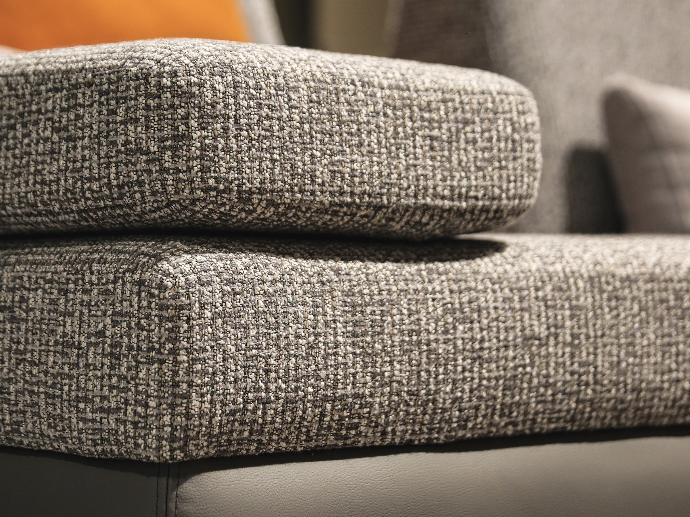 Close-up of textured gray fabric on a sofa