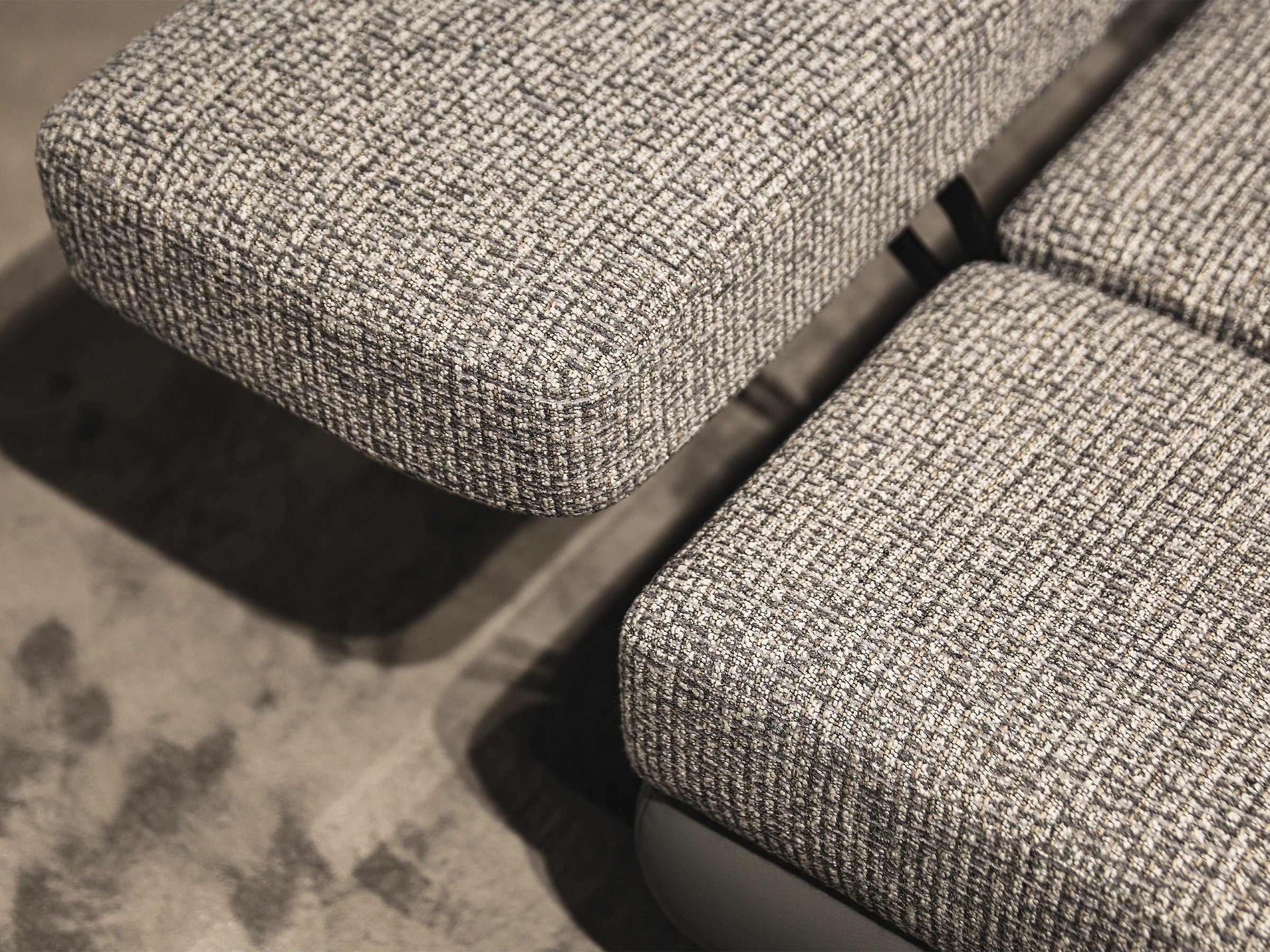 Close-up of textured gray fabric on a chair