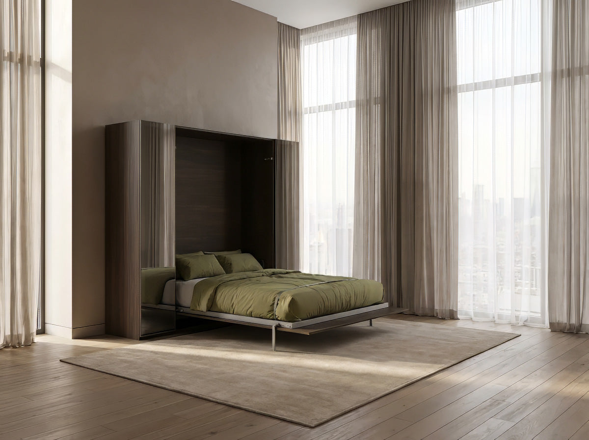 Modern bedroom with a bed and wardrobe against a wall with large windows.