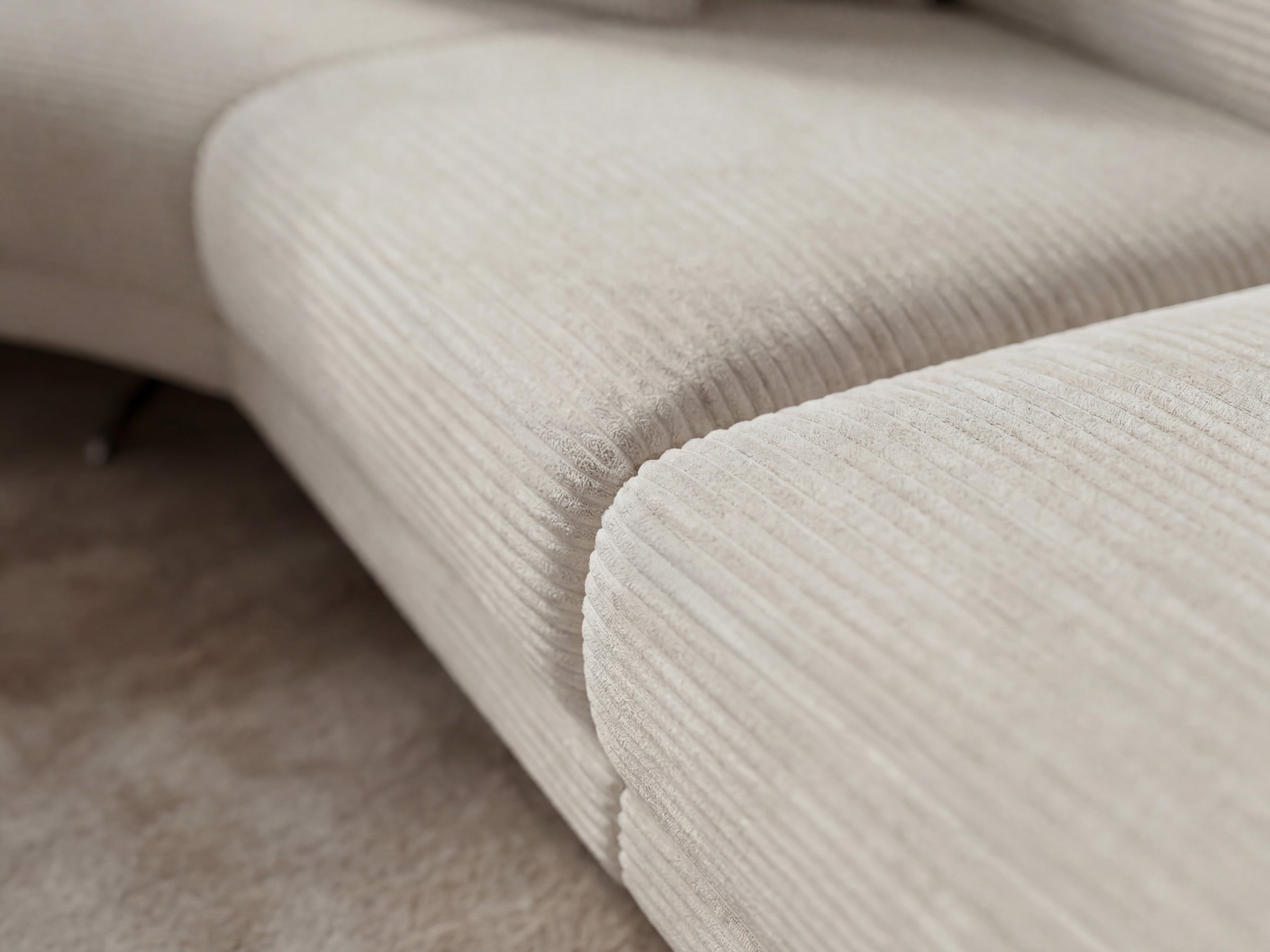 Close-up of a beige textured sofa