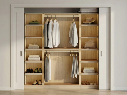 Wooden wardrobe with clothes and shoes inside a room.
