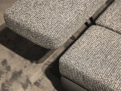 Close-up of textured gray fabric on a chair
